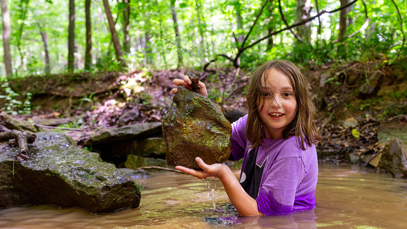 showing off rock in creek