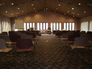 picture of chairs set up at friends lodge facing a window